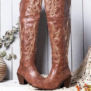 Knee high cowgirl boots